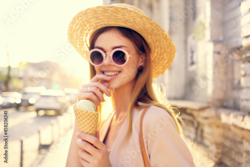 pretty woman outdoor walk eat ice cream walk travel model