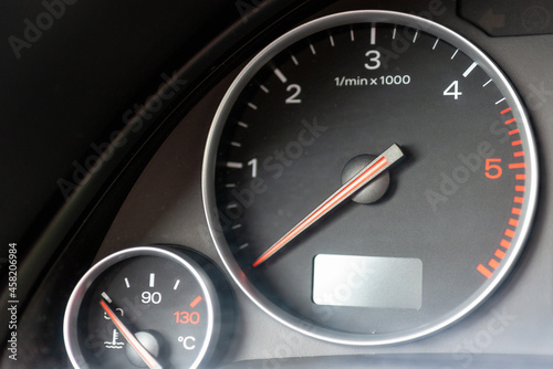 Dashboard with speedometer, tachometer, odometer. Car detailing. Car dashboard. Dashboard details with indication lamps.Car instrument panel.Modern interior.Close up shot.