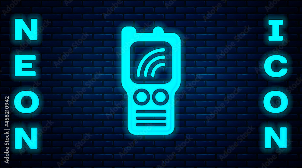 Glowing neon Walkie talkie icon isolated on brick wall background. Portable radio transmitter icon. Radio transceiver sign. Vector Glowing neon Walkie talkie icon isolated on brick wall background. Portable radio transmitter icon. Radio transceiver sign. Vector