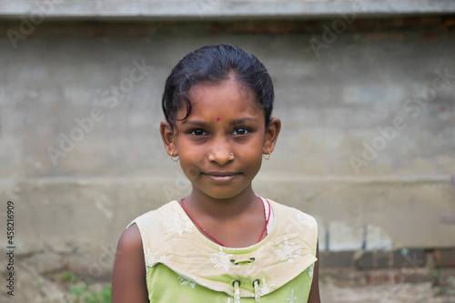 Fototapeta Portrait Of Happy Indian Rural girl In Village