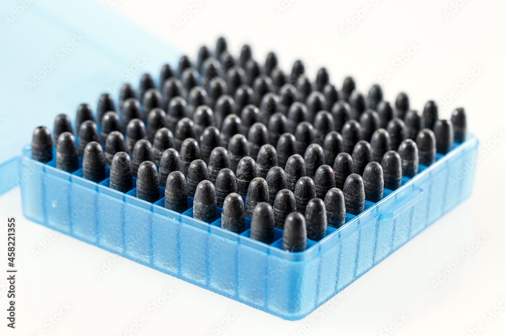 Hunting cartridges in a plastic box. Bullet storage box. Hunting cartridges in a plastic box. Bullet storage box.