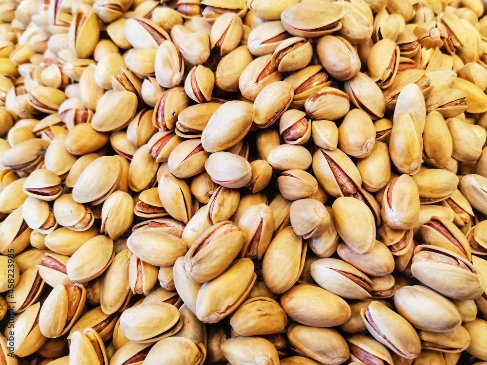 Close-up pine nuts. Background pine nuts and detail shot.
Close-up pine nuts. Background pine nuts and detail shot.