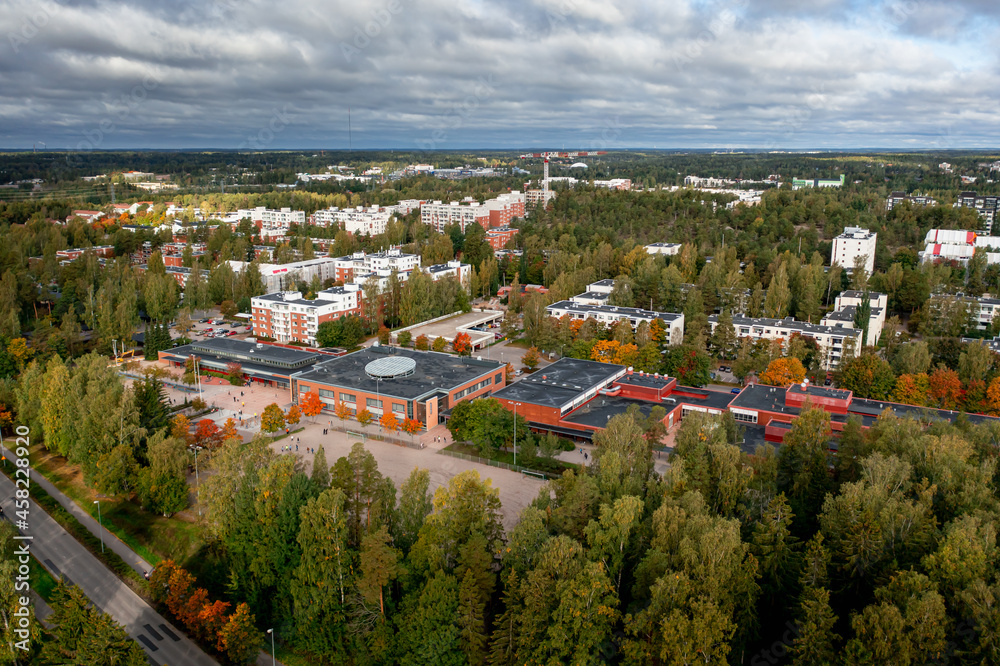 Fototapeta premium Aerial view over the school building during the gold autumn in Finland.