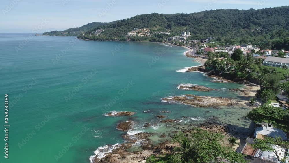 Aerial view Drone camera top view of seashore rocks in Phuket ocean Sea waves on beautiful seascape aerial view drone 4k High quality of ocean waves crashing against an empty stone rock cliff Aerial view Drone camera top view of seashore rocks in Phuket ocean Sea waves on beautiful seascape aerial view drone 4k High quality of ocean waves crashing against an empty stone rock cliff