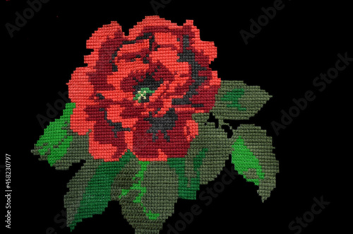 Embroidered red rose flower against the drawn background, fabric decor, element of the embroidered bouquet, Ukrainian folk embroidery
