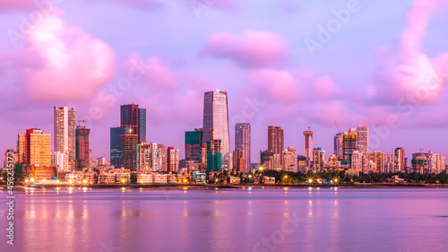 Mumbai- the skyline of an island city with a beautiful pink sky.