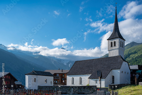 Parish church in Bellwald with ossuary and cemetery