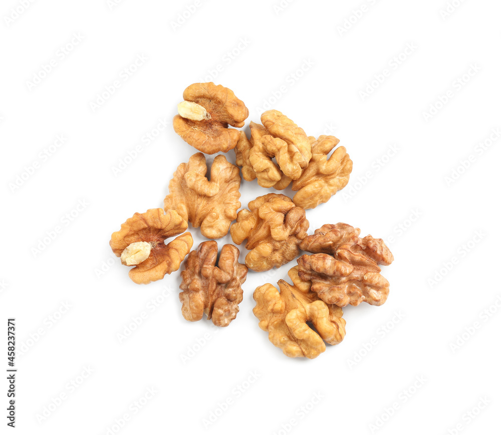 Pile of peeled walnuts on white background, top view Pile of peeled walnuts on white background, top view