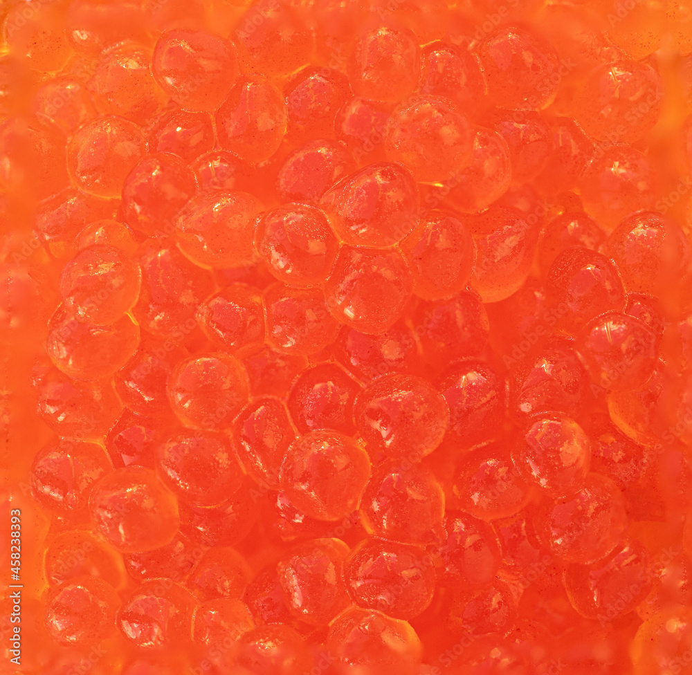 Red salmon caviar texture as a background. Caviar Pattern Red salmon caviar texture as a background. Caviar Pattern