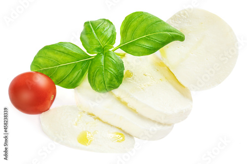 Mozzarella cheese with basil leaves and tomato   isolated on white background. Slices of Mozzarella