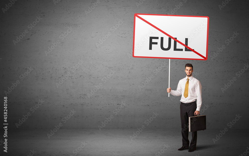 business person holding a traffic sign business person holding a traffic sign