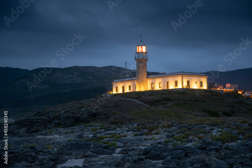 Lariño lighthouse at night. Carnota, Galicia. photo