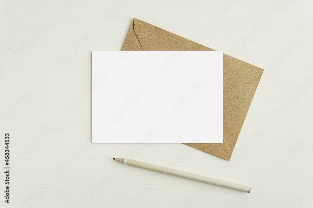 Small horizontal A6 size note card mockup for design presentation, postcard, greeting card mock up with envelope and pencil. Small horizontal A6 size note card mockup for design presentation, postcard, greeting card mock up with envelope and pencil.