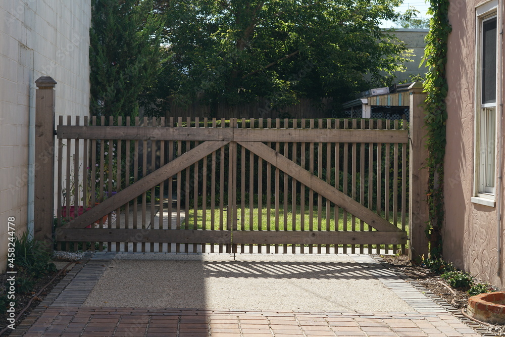 Wooden gate in driveway