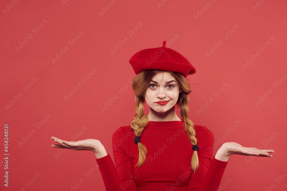 pretty woman in a red sweater cosmetics emotion red background pretty woman in a red sweater cosmetics emotion red background