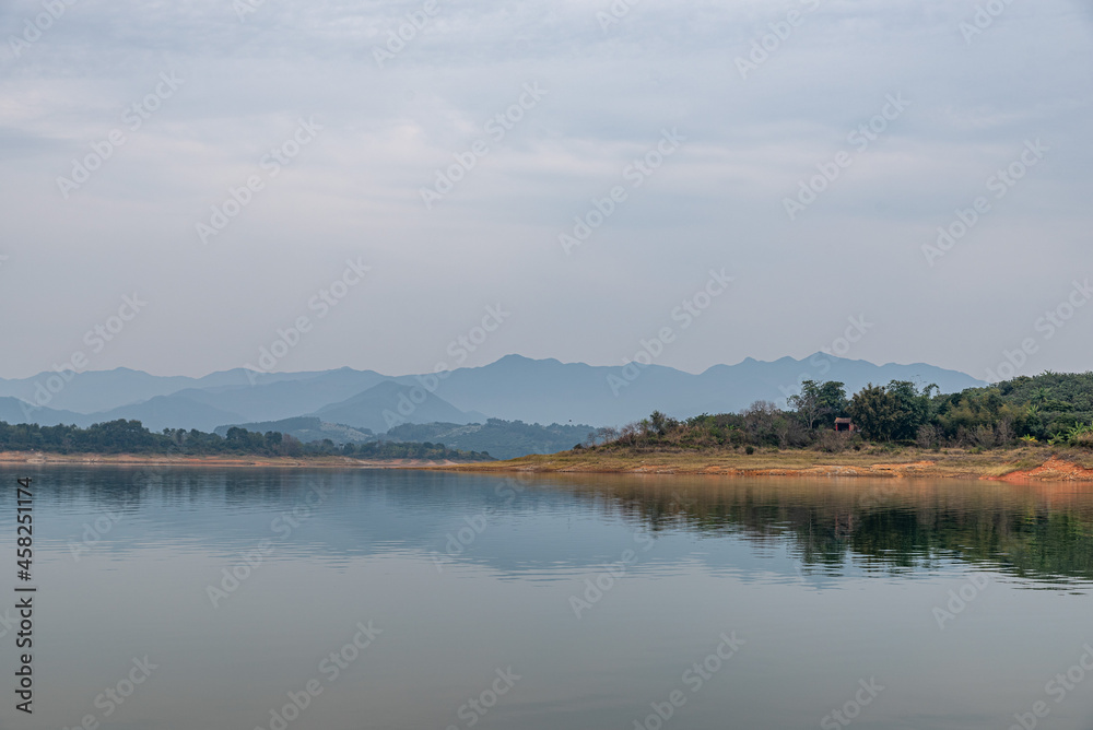 The view of the lake on a cloudy day in autumn The view of the lake on a cloudy day in autumn