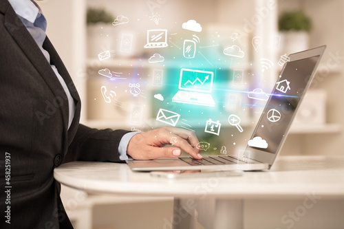 Businessman working on laptop with new business concept