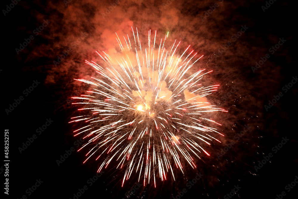 Beautiful bright firework lighting up night sky Beautiful bright firework lighting up night sky