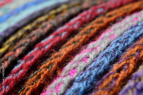 knitted multi-colored yarn. close-up. © Oleg