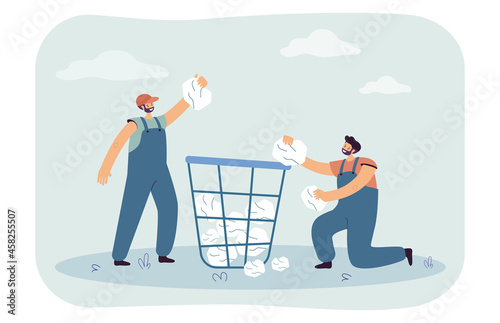 Janitors throwing paper into huge bin. Male characters in uniform throwing garbage into trash can flat vector illustration. Recycling, ecology concept for banner, website design or landing web page