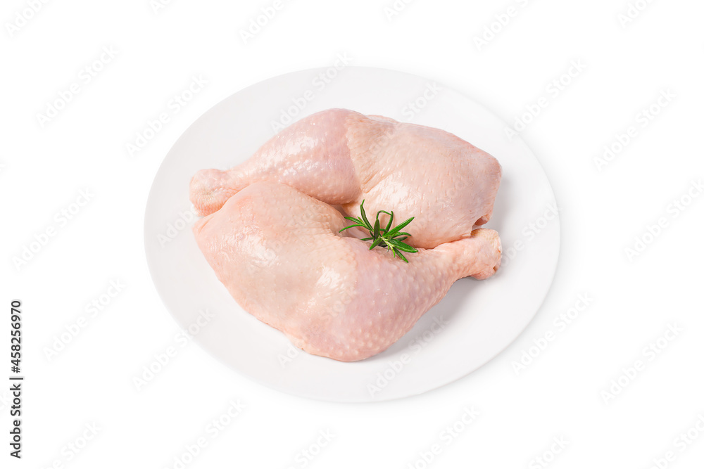 Fresh chicken legs.Top view Two raw whole chicken legs on a white plate on a white isolated background. Fresh chicken legs.Top view Two raw whole chicken legs on a white plate on a white isolated background.