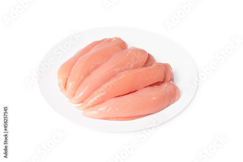 Close-up of fresh chicken inner fillet on a white plate , background.Closeup of chicken meat.Healthy chicken mini inner breast fillets .