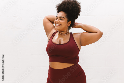 Body positive woman relaxing after workout