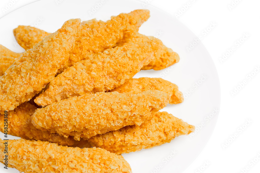 Raw chicken fillet inner, sprinkled with bright breading.