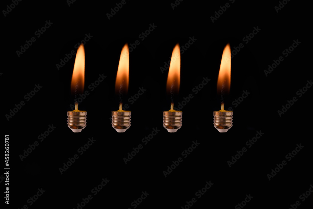Fototapeta premium Bulb screw with candle flame. 