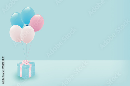 パステルカラーの風船とプレゼントボックス
