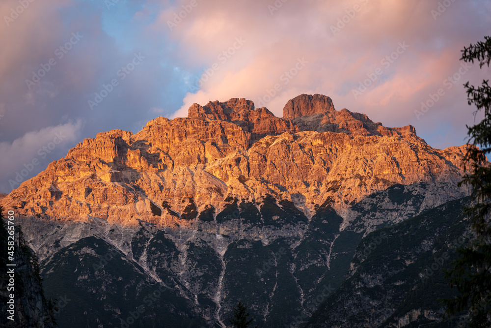 Mountain peak of the Monte Rudo or Rautkofel of the Mountain Range of the Rondoi-Baranci at sunset, seen from the Landro valley (Val di Landro), Dolomiti Di Sesto Natural Park, Trentino, Italy, Europe