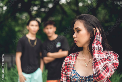 Photography A nervous woman notices two men following her