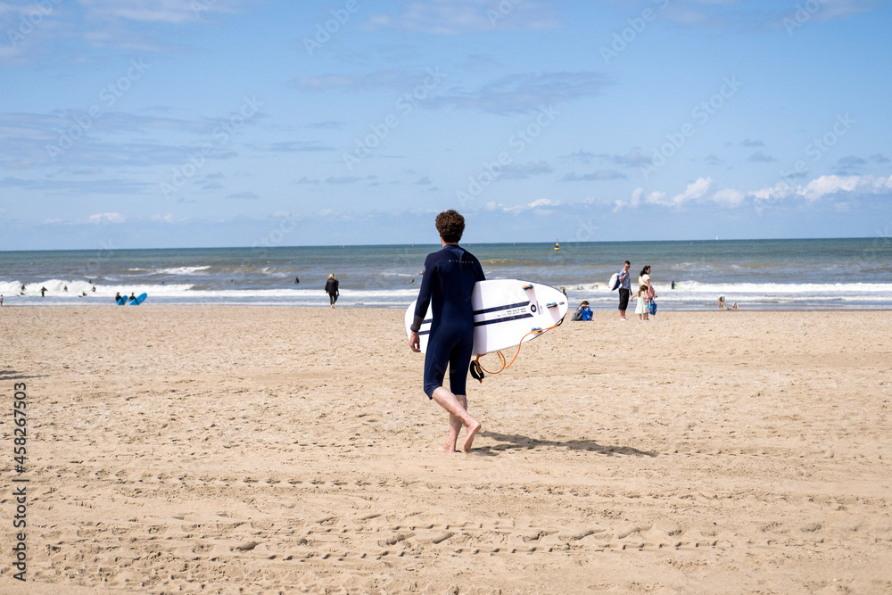 surfer on the beach, blue, ocean, scheveningen, the hague, den haag, sand