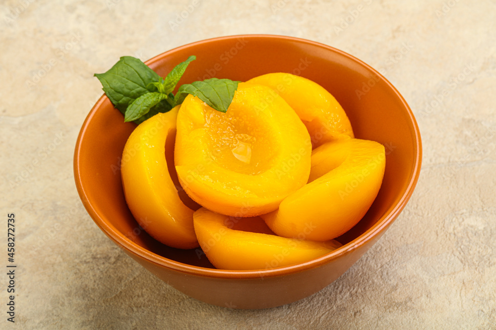 Sweet ripe canned peaches with mint Sweet ripe canned peaches with mint