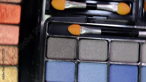 multi-colored eye shadow cosmetics background palette. Beauty and cosmetics concept