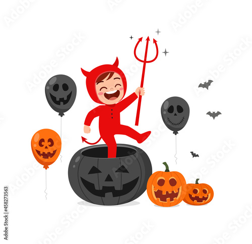 cute little boy celebrate halloween wear devil costume