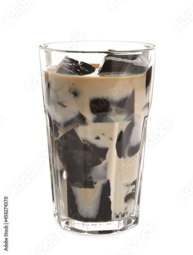 Glass of milk with grass jelly isolated on white