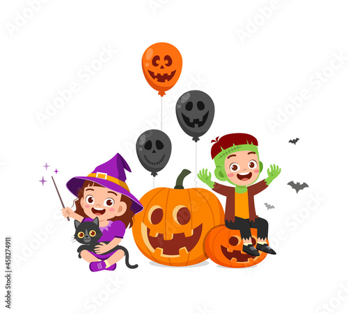 cute little boy and girl celebrate halloween with friend