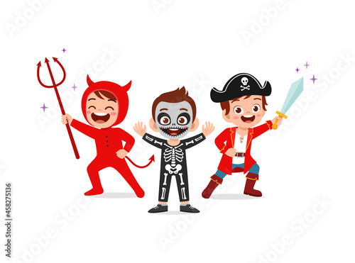 cute little boy and girl celebrate halloween with friend