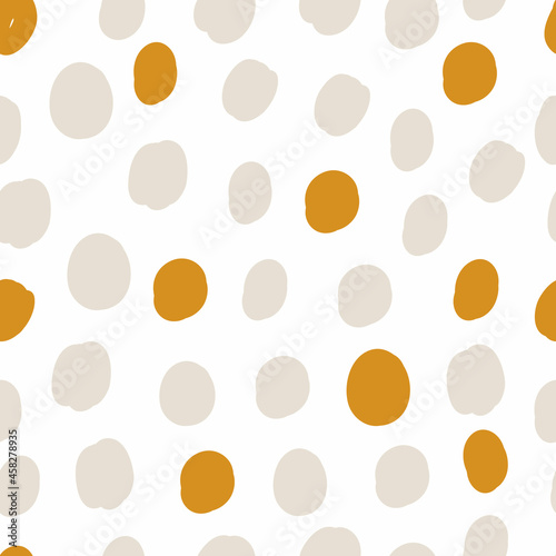 Vector abstract cute hand drawn seamless pattern with a irregular dots on a white background. Pastel baby texture ideal for fabric, wallpaper, wrapping paper, card, layout. Delicate children's print.