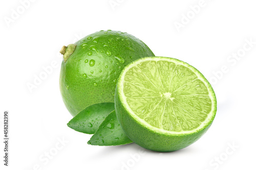 Natural  fresh lime with cut in half and water droplets  isolated on white background. © Paitoon