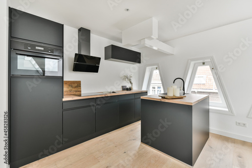 Modern kitchen with matte black furniture