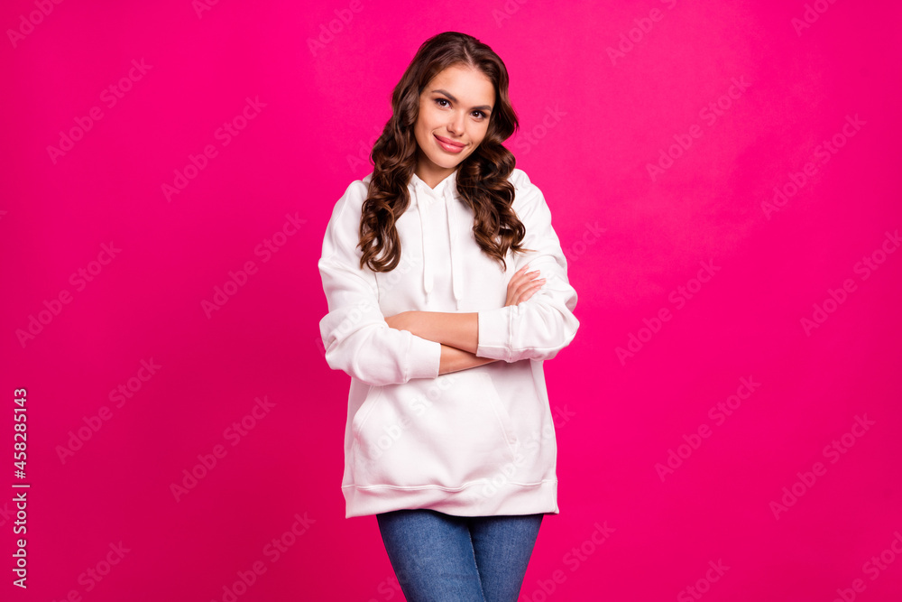 Photo of young girl happy positive smile folded hands confident wear hoodie isolated over pink color background