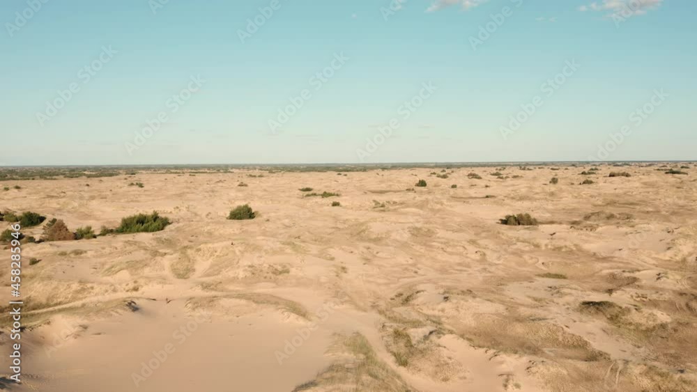 Aerial view of a desert, sand dunes. Texture of the surface of desert nature Aerial view of a desert, sand dunes. Texture of the surface of desert nature