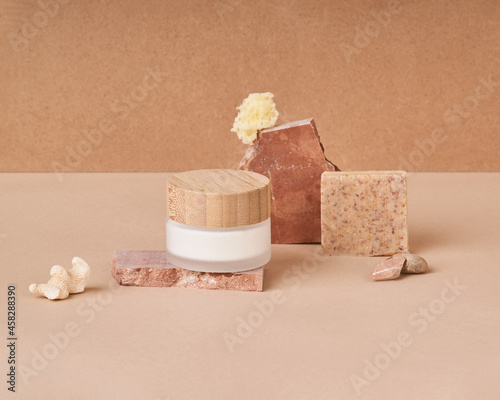 Natural cosmetic products and soap bars with sponge photo