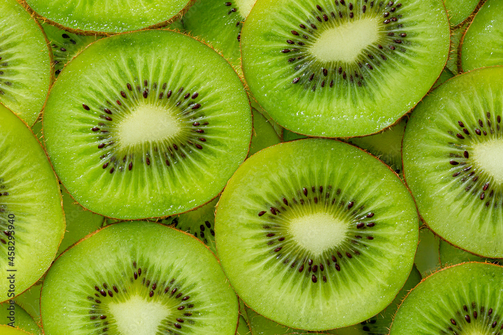Kiwi Macro,Kiwi fruit pattern. Healthy food background, overhead. Kiwi Macro,Kiwi fruit pattern. Healthy food background, overhead.