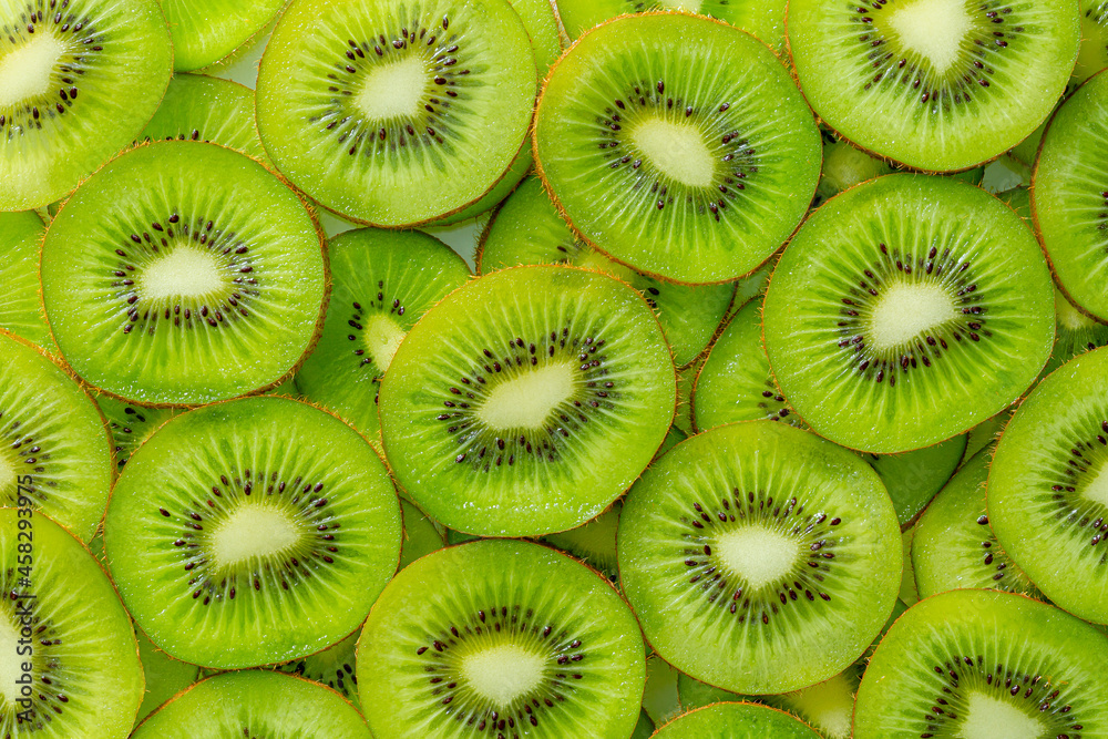 Kiwi Macro,Kiwi fruit pattern. Healthy food background, overhead. Kiwi Macro,Kiwi fruit pattern. Healthy food background, overhead.
