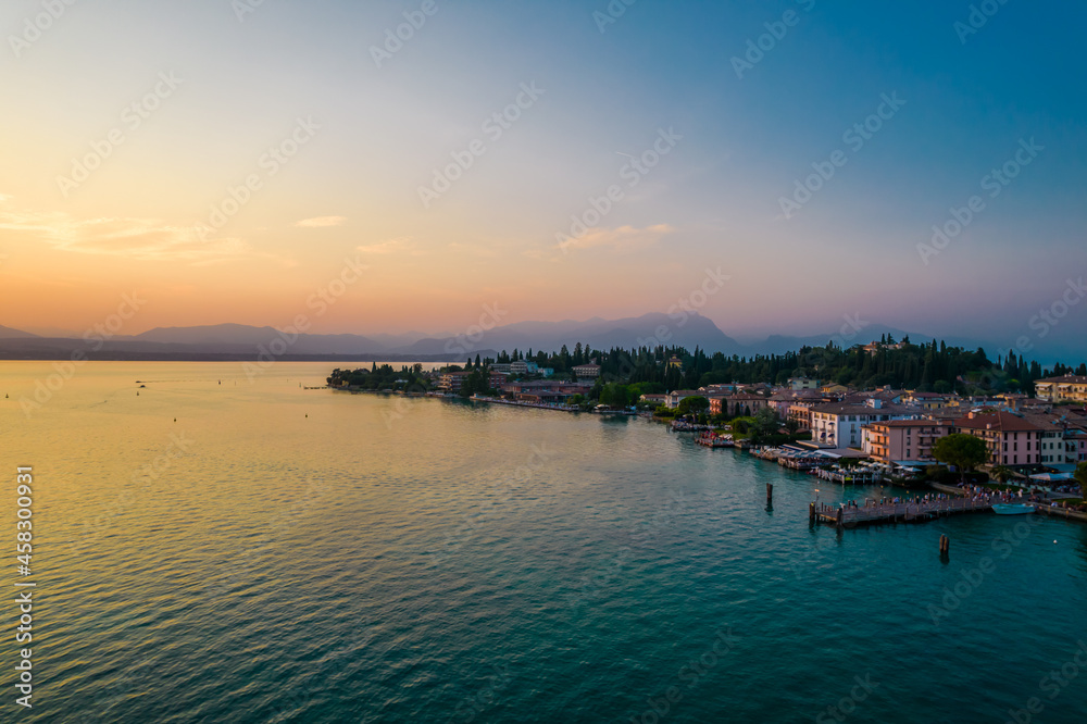Aerial view of Sirmione resort coastline in Italy on the shore of Como lake in Lombardy