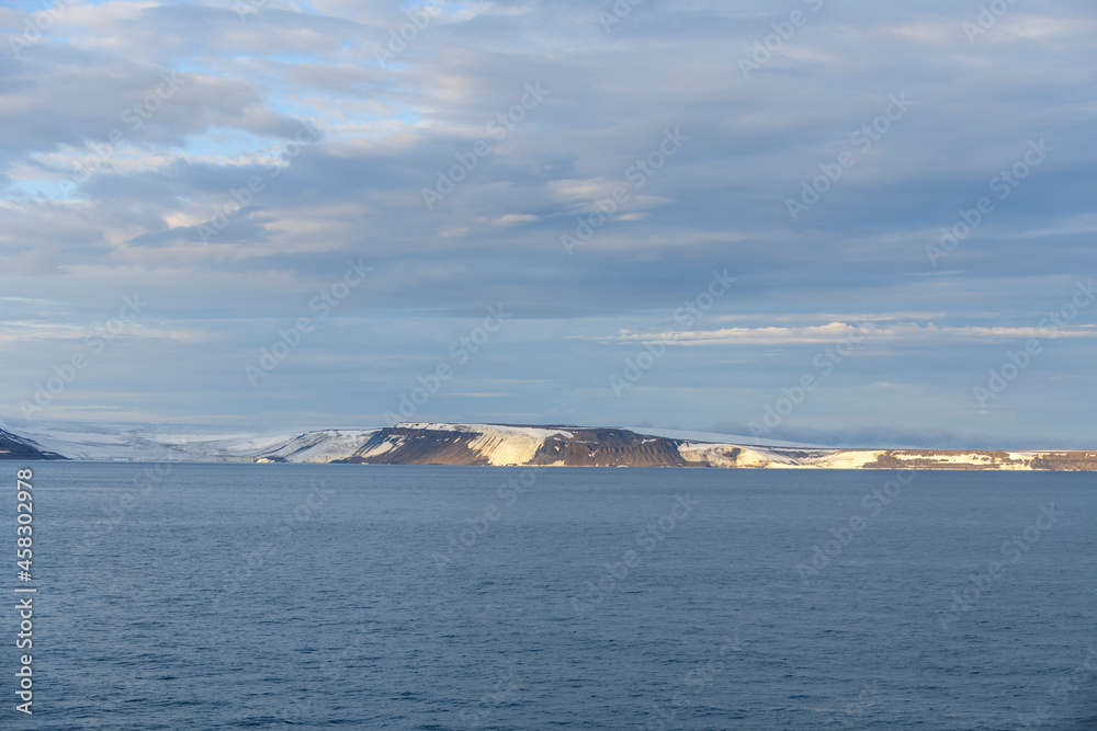 Arctic landscape in summer time. Franz Jozef Land archipelago. Flora cape, Gukera island.