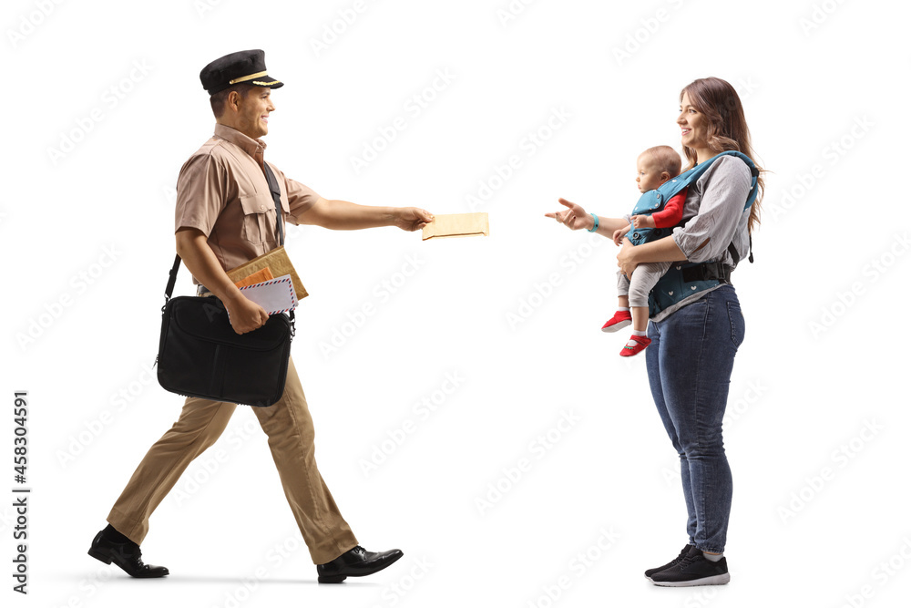 Fototapeta premium Full length profile shot of a mailman delivering letter to a mother with a baby